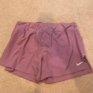 Pink/mauve Nike running shorts never worn-L